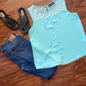 Sky blue blouse.